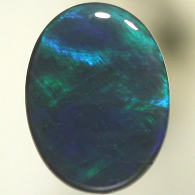 SOLID BLACK OPAL Sheen pattern of turquoise to green to ocean blue